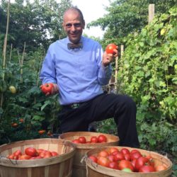 Stephen with Tomatoes at the Food For Others Garden